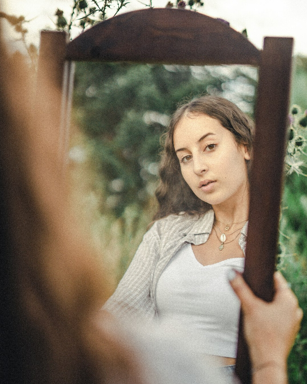 person facing fears in mirror