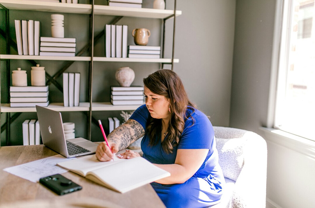 woman journaling at home